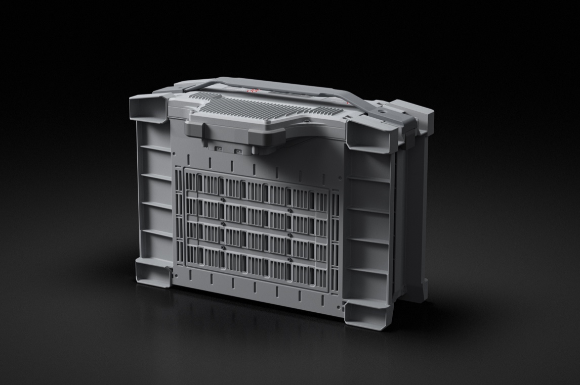 Grey DJI intelligent flight battery with a carry handle and cooling grille, shown on a dark background