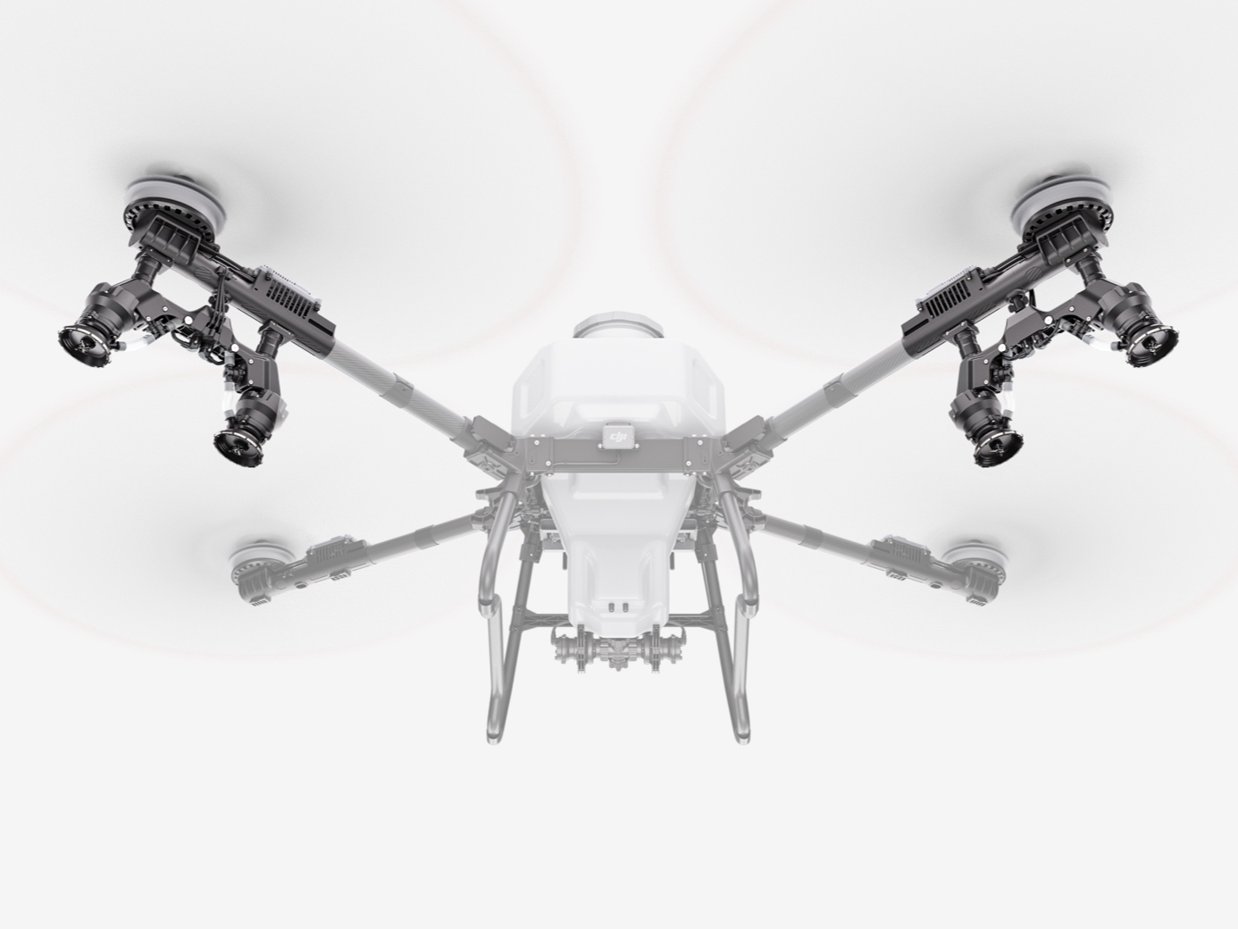 DJI Agras T55 seen from above on a white background, showing the tank, arms and centrifugal nozzles