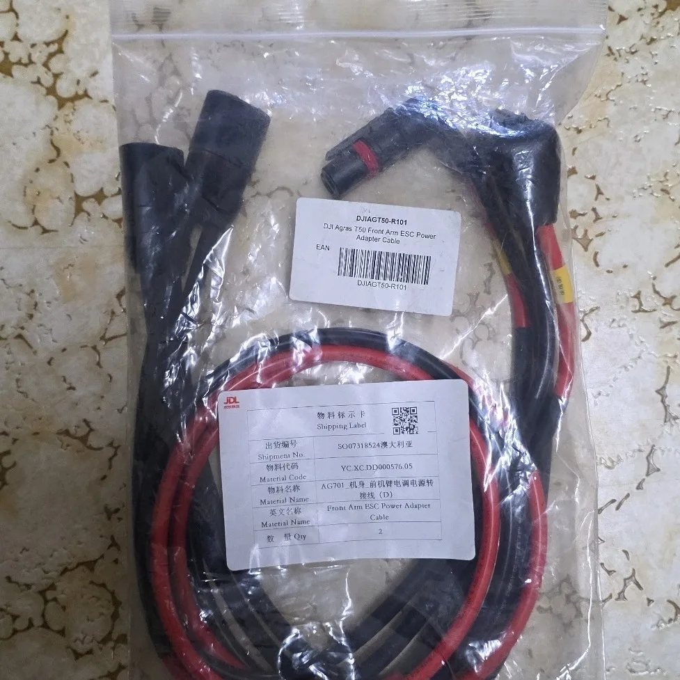 DJI Agras T50 Front Arm ESC Power Adapter Cable in its supplier bag with red and black leads and connectors