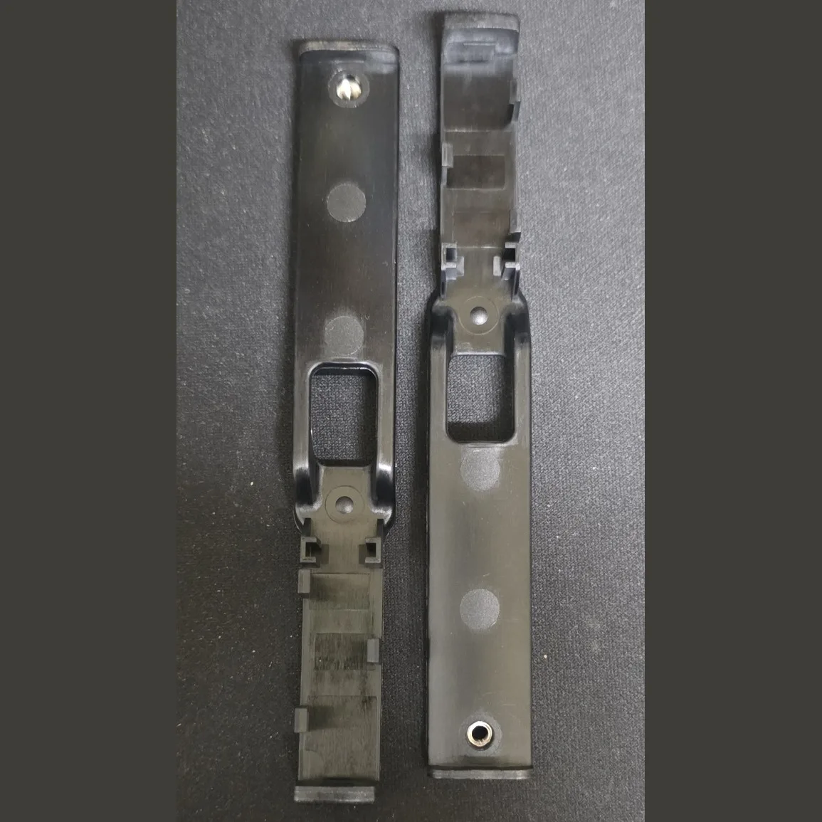 Two DJI Agras T50 In-Position Detector Brackets showing the front and back of the part